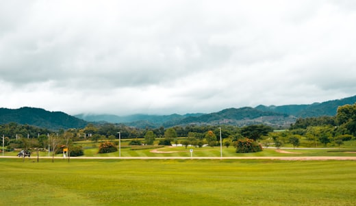 Golf fairway with mountains behind