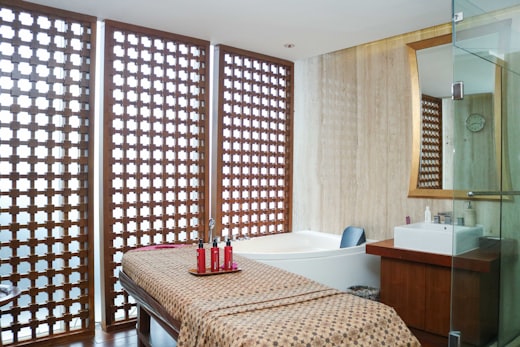 Treatment room with a carved timber screen